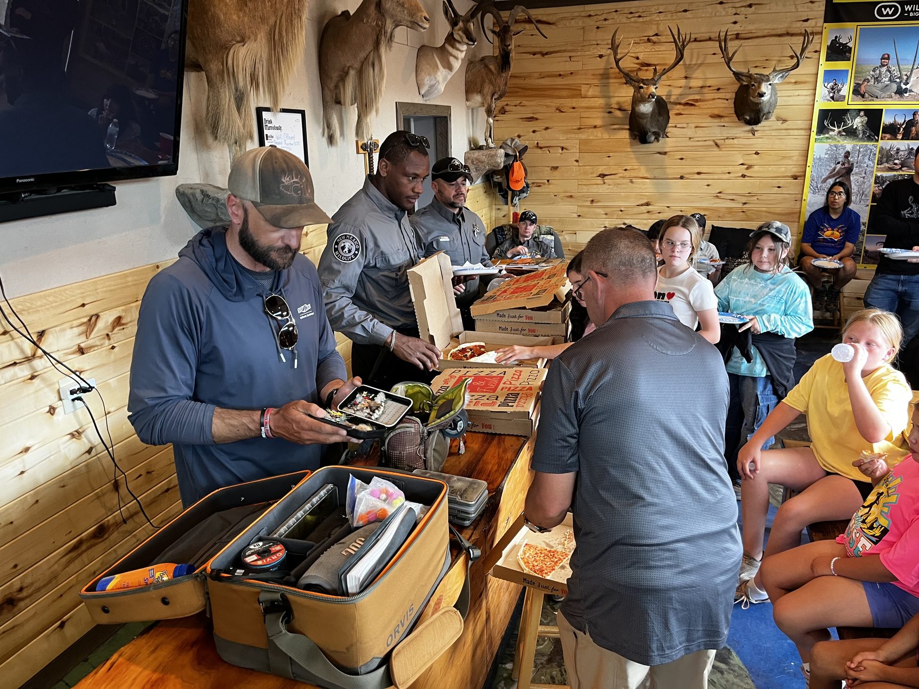 Fly fishing gear clinic in the common room