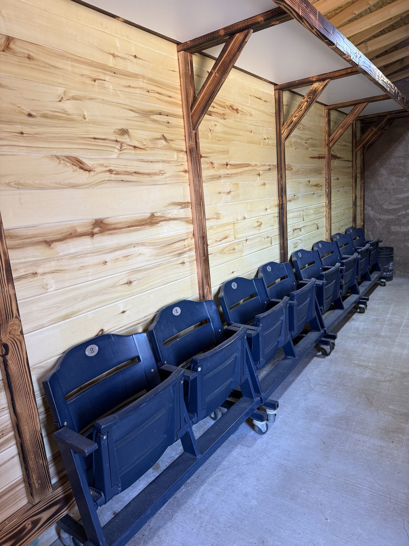 Stadium seating in the covered outdoor area